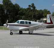 Mooney M20F N6377Q taxiing through Spruce Creek  Fly In Community in Florida